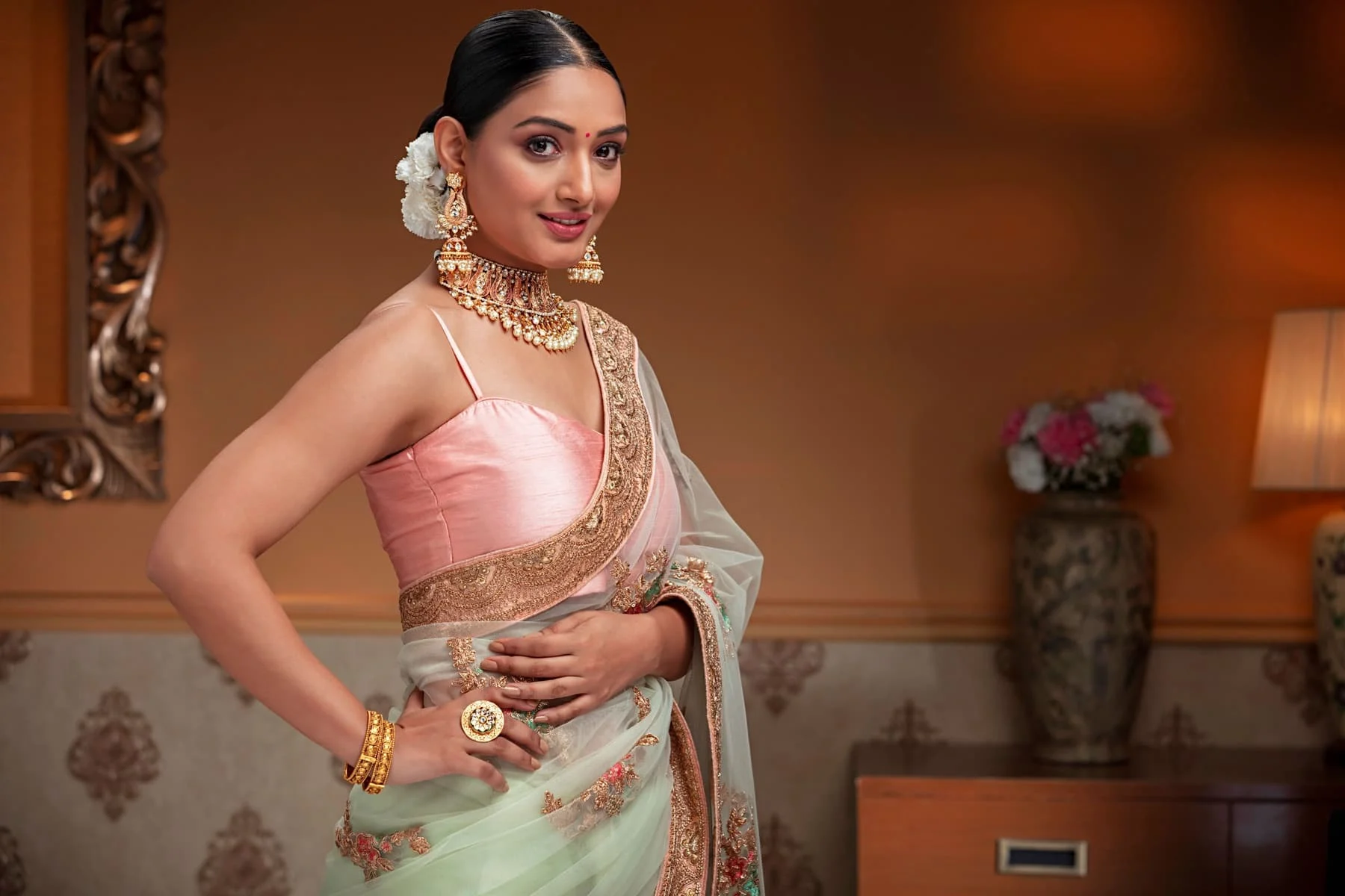 Expecting mother in a saree